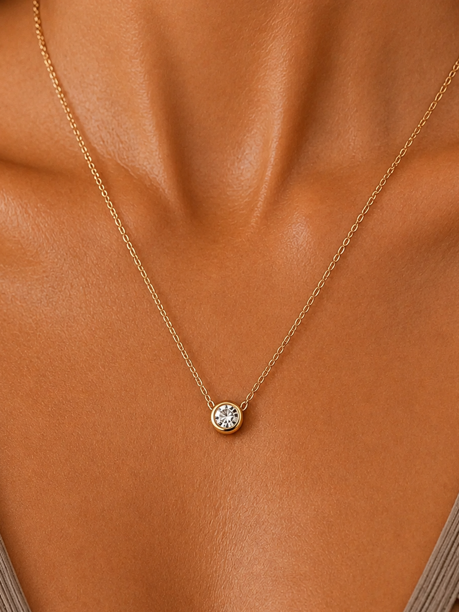 
                  
                    Celeste Cubic Zirconia Solitaire Necklace – Waterproof Gold Stainless Steel
                  
                
