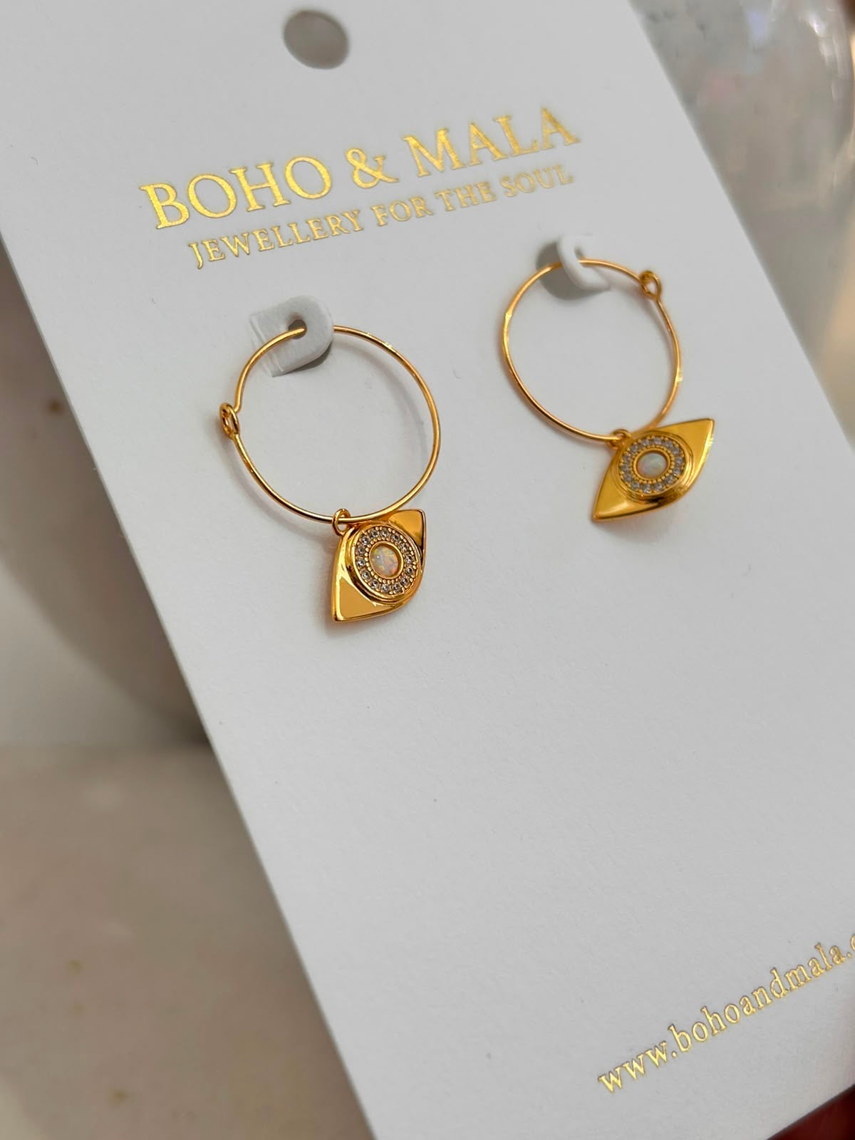 
                  
                    Opal Evil Eye Hoop Earrings
                  
                