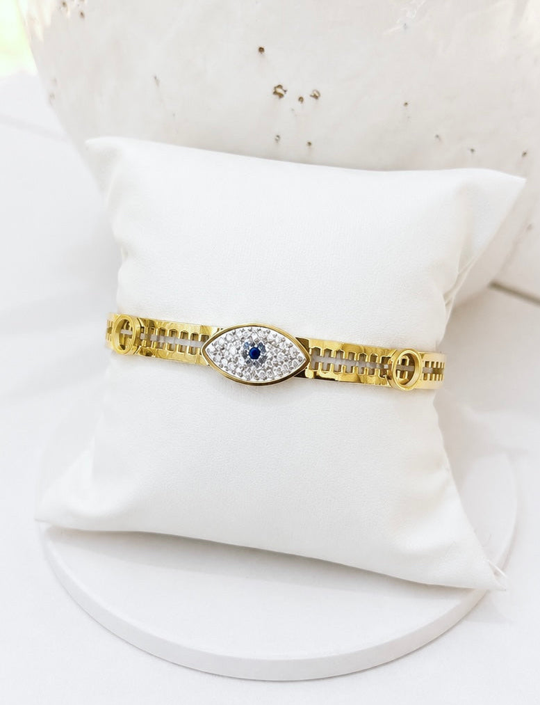 
                  
                    Close-up of the Nazari Evil Eye Gold Bangle
                  
                