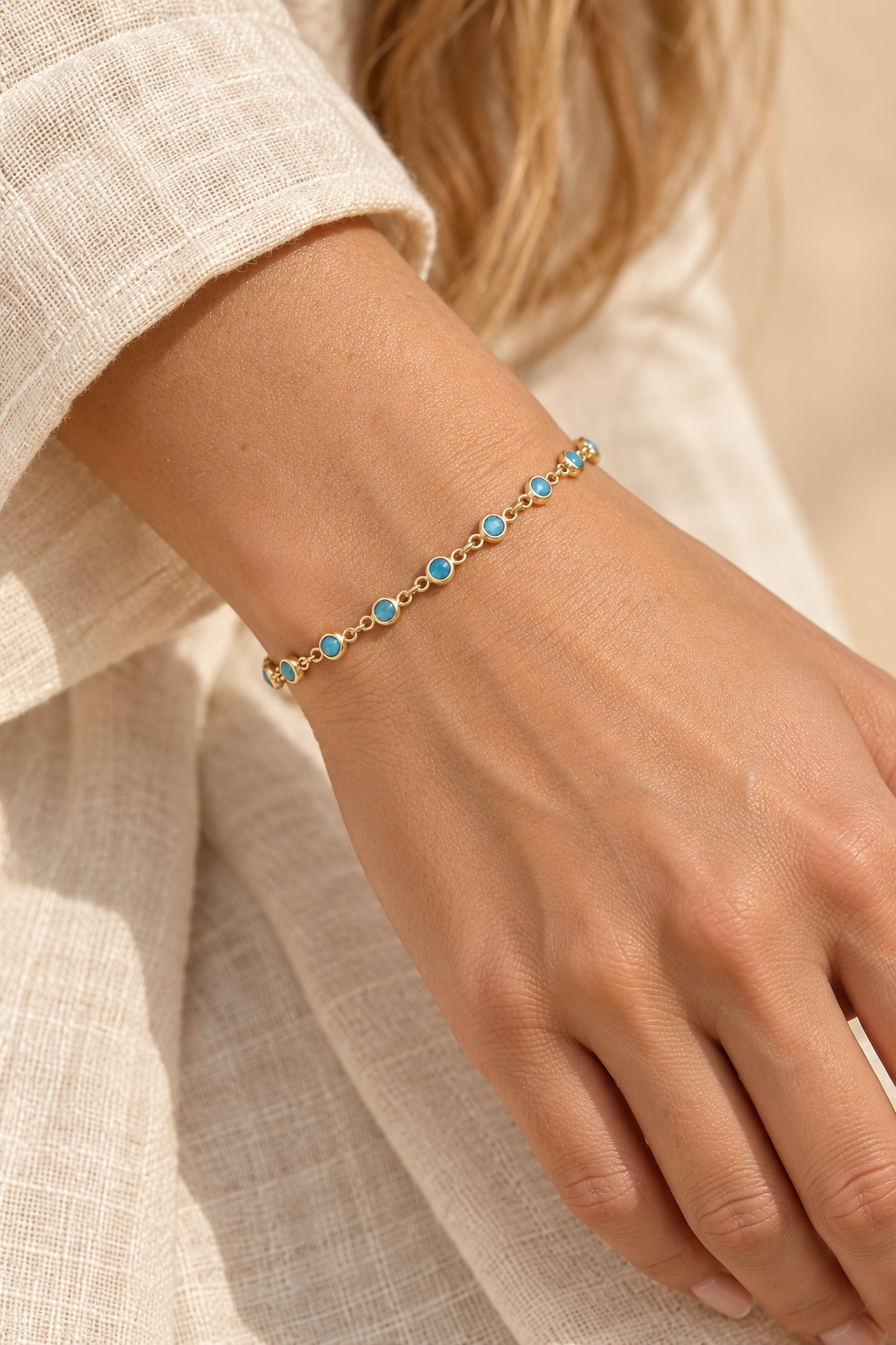 4mm 10inch Turquoise Gold Chain Bracelete TF worn on a model's wrist