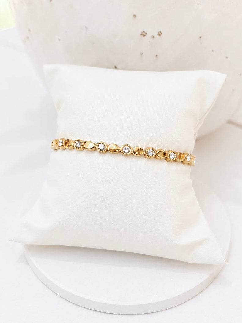 
                  
                    Close-up of the Aurette Gold Beaded Crystal Bangle
                  
                