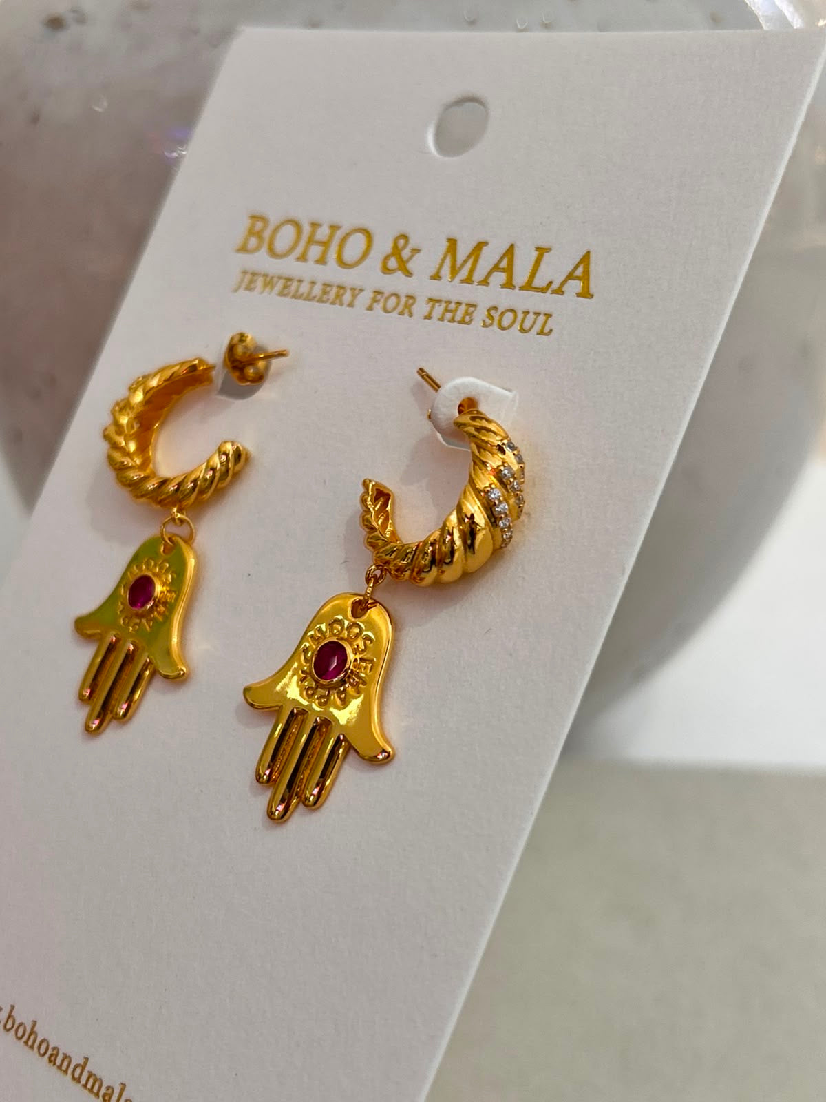 
                  
                    Asha Gold Stud Earrings
                  
                