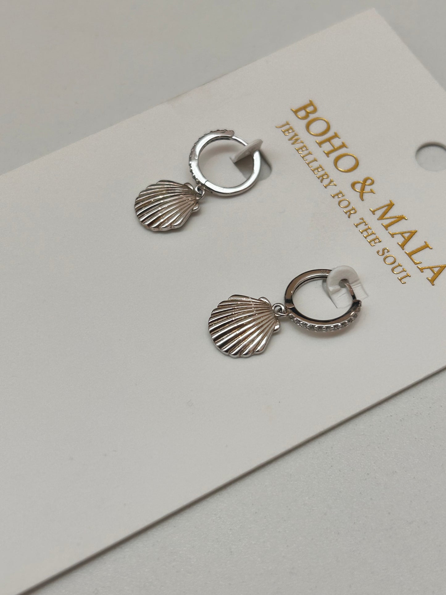 
                  
                    Nerida Silver Scallop Shell Hoop Earrings - Sterling Silver
                  
                