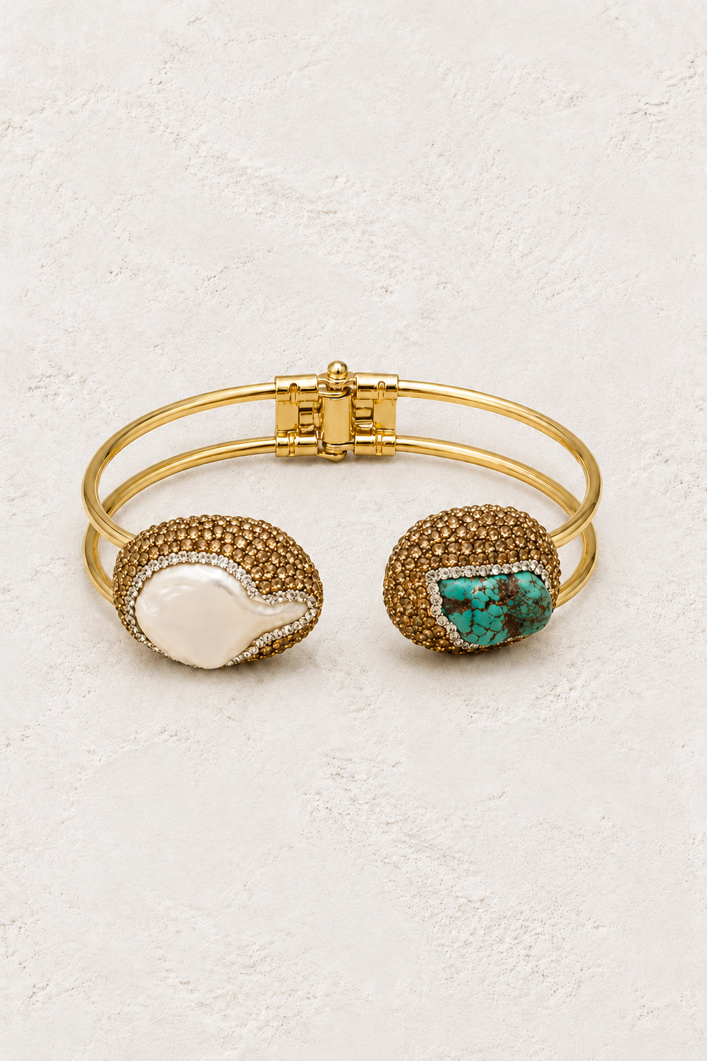 Maristella Turquoise & Freshwater Pearl Cuff on warm ivory plaster