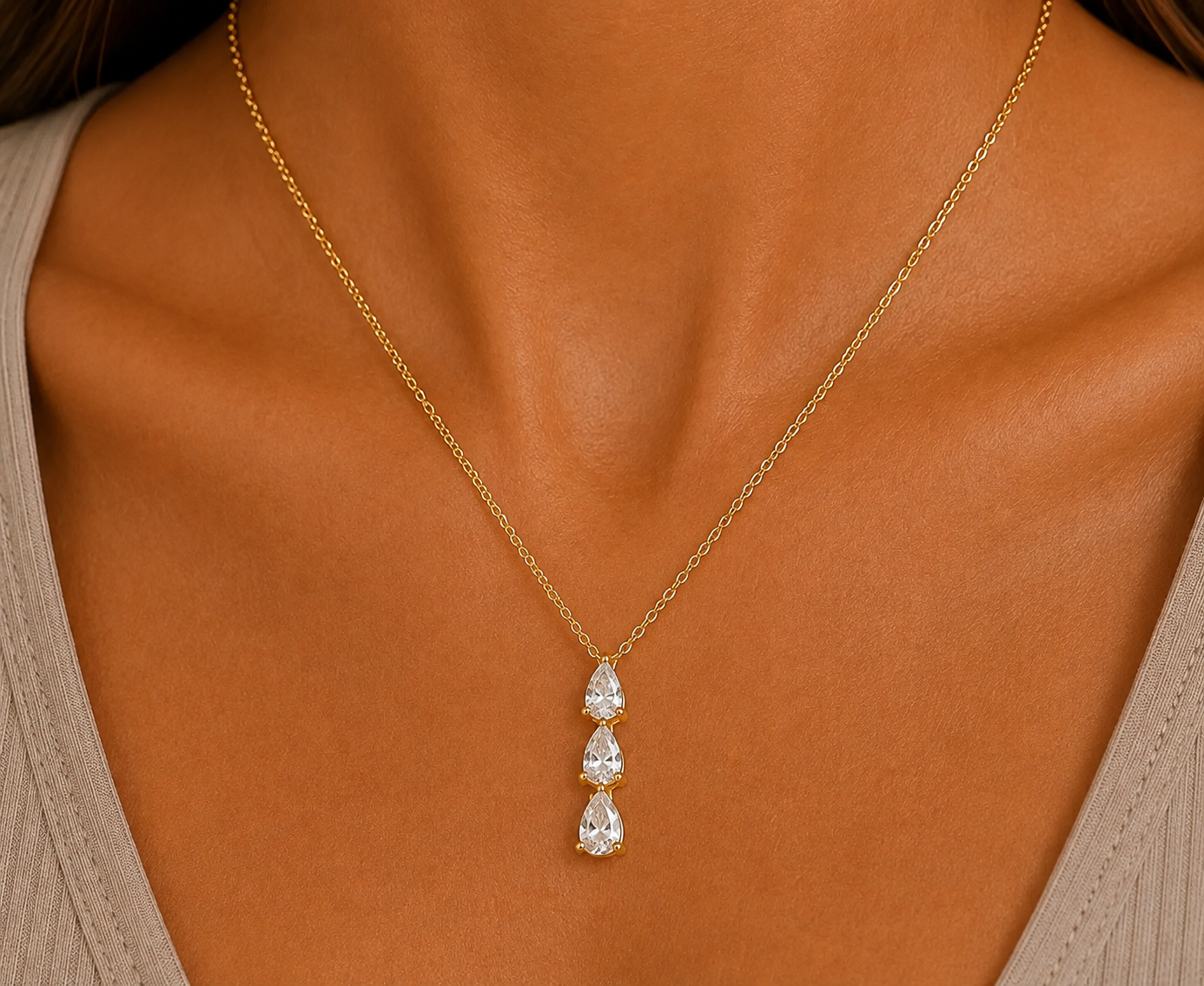 
                  
                    Amara Triple Zirconia Drop Necklace – Waterproof Gold-Plated Stainless Steel
                  
                