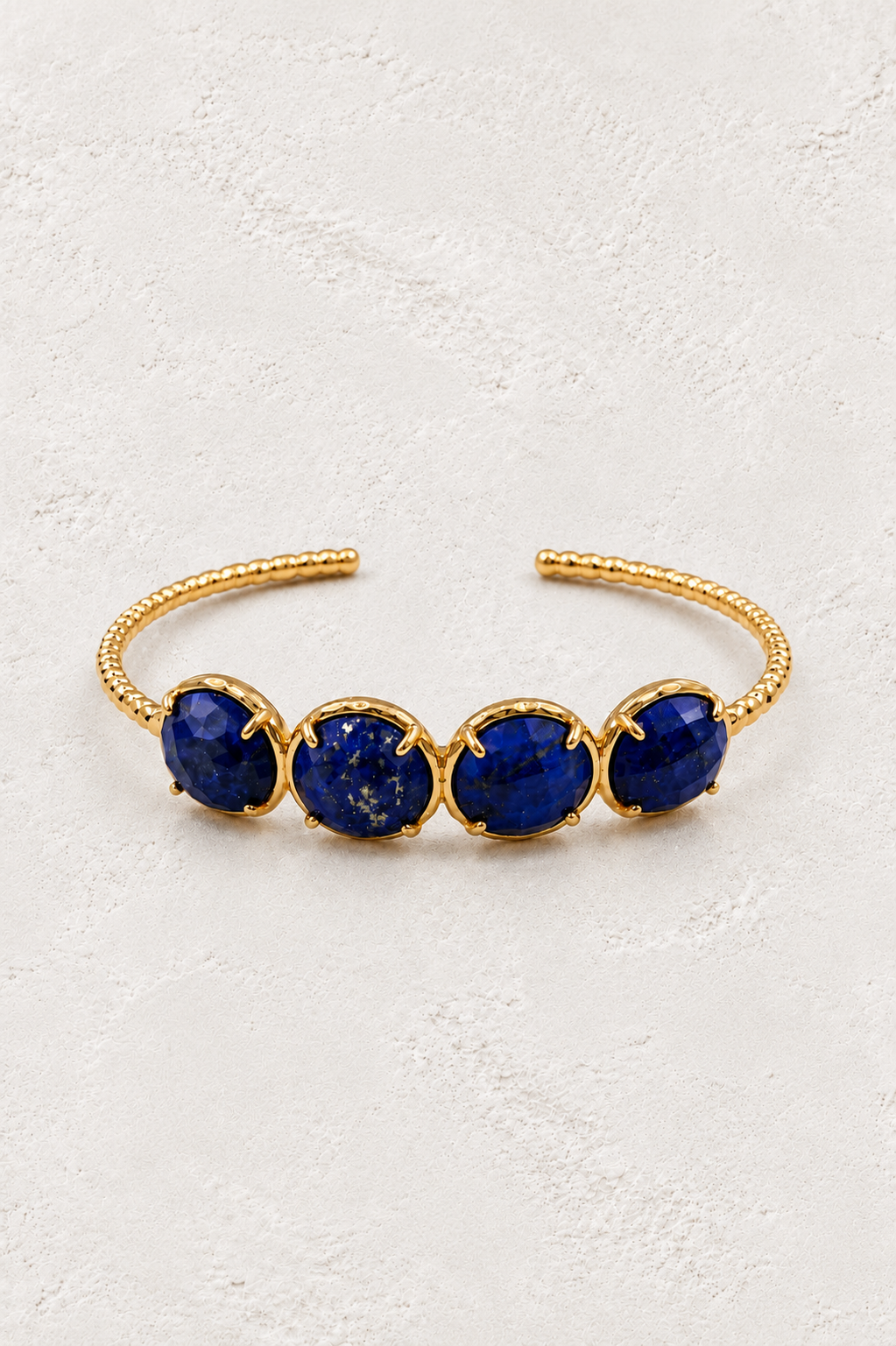 Lapis Lazuli Laguna Cuff Bracelet on warm ivory plaster