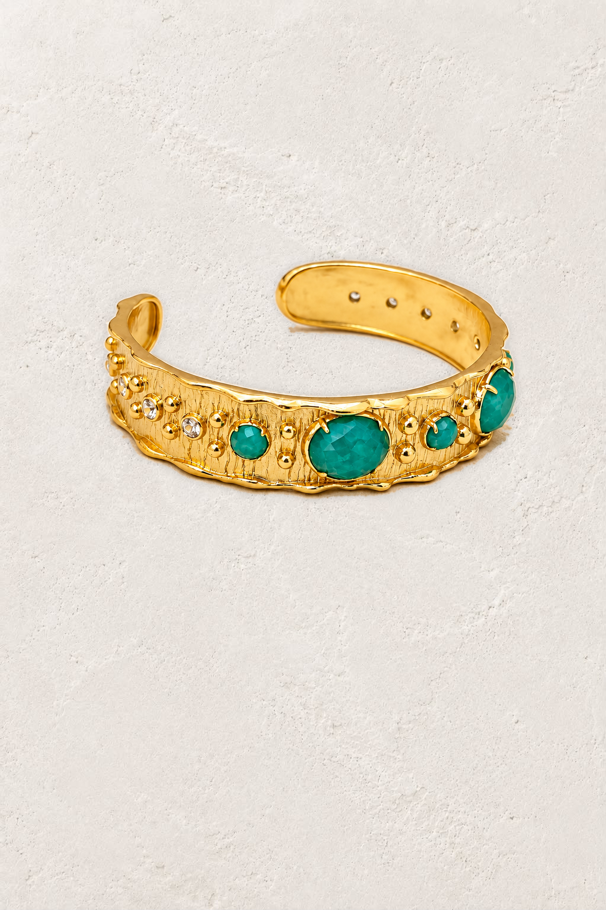 
                  
                    Amazonite Solara Cuff Bracelet on the reference plaster background
                  
                