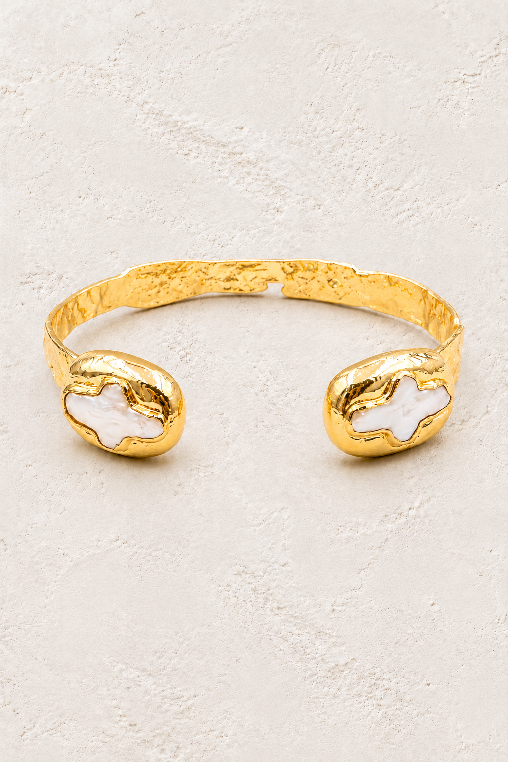 Cross Thalassa Fresh Water Pearl Cuff Bracelet on warm ivory plaster