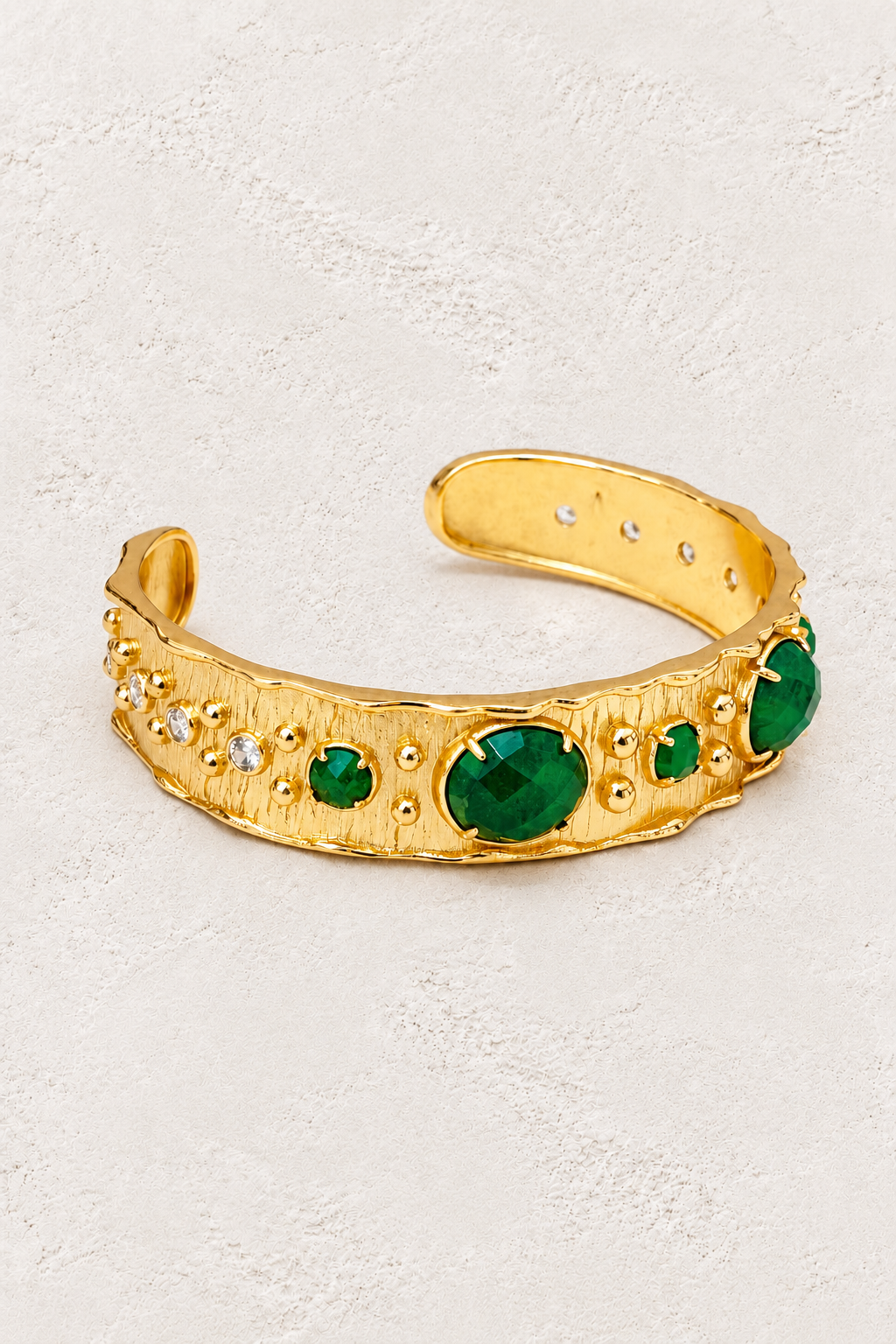Green Jade Solara Cuff Bracelet on warm ivory plaster