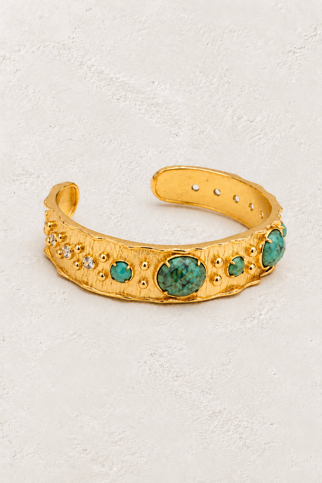 African Turquoise Solara Cuff Bracelet on warm ivory plaster