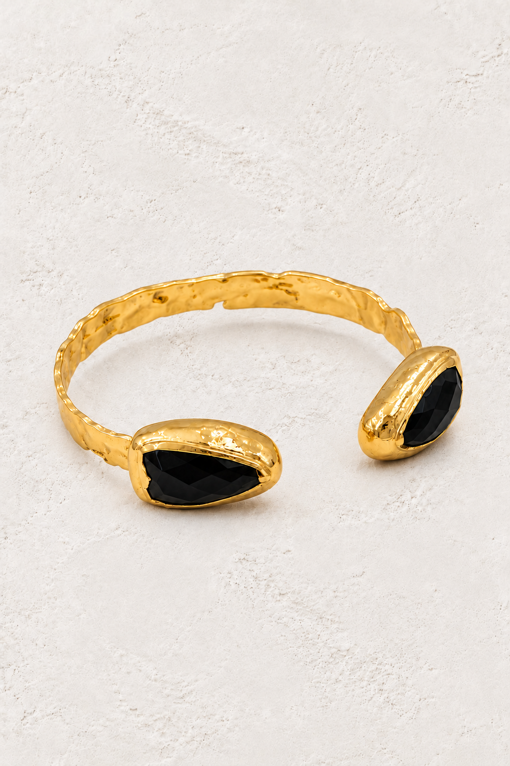 Coralia Black Obsidian Cuff on warm ivory plaster