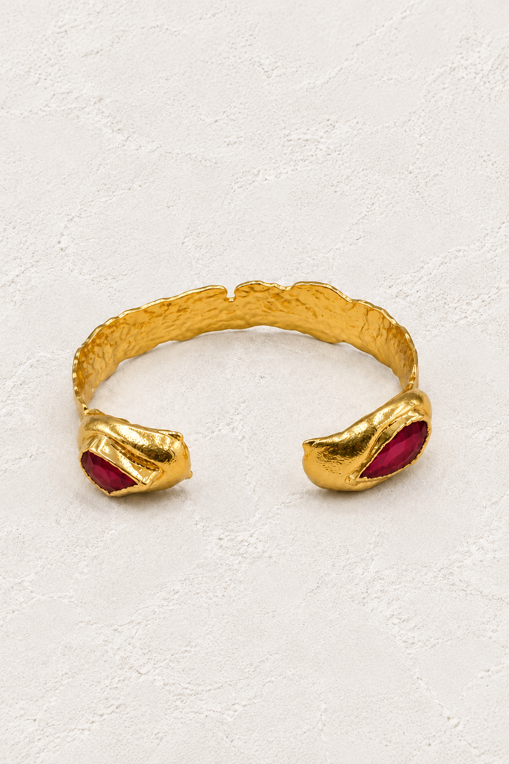Coralia Red Coral Cuff on warm ivory plaster