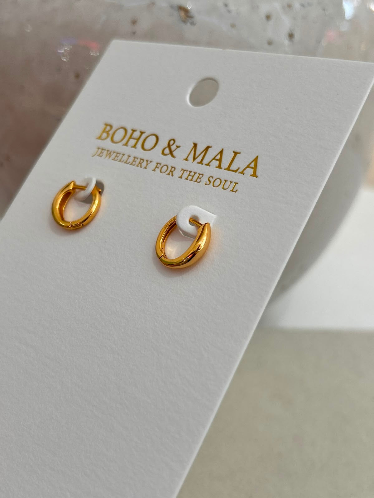 
                  
                    Talia Gold Huggie Earrings
                  
                