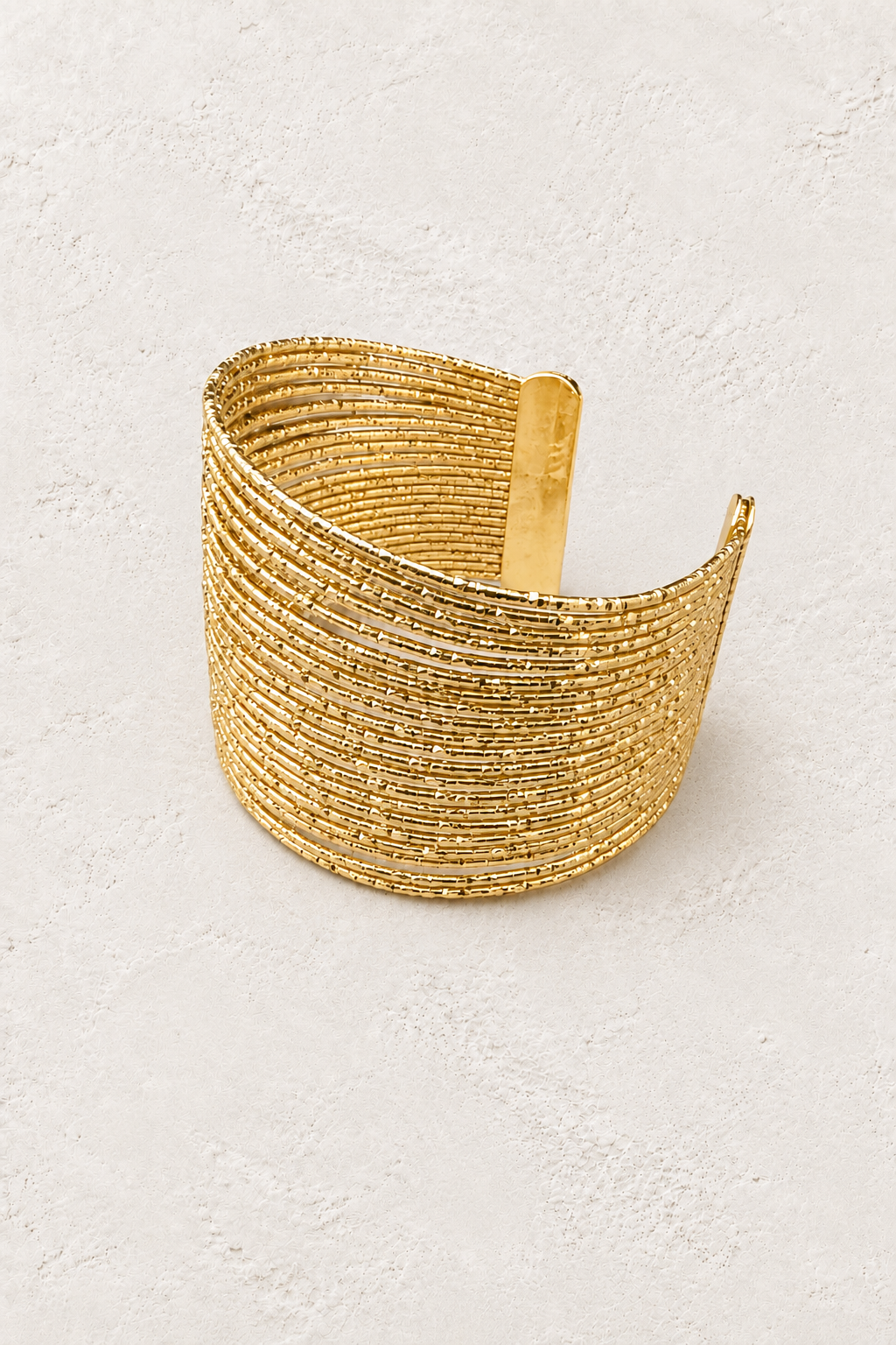 Zahara Multi-Strand Cuff on warm ivory plaster