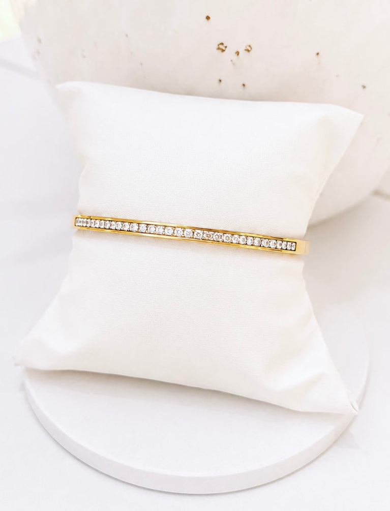 
                  
                    Close-up of the Roselle Gold Princess-Cut Crystal Bangle
                  
                