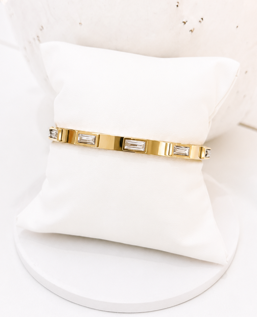 
                  
                    Close-up of the Emerelle Clear Crystal Gold Bangle
                  
                