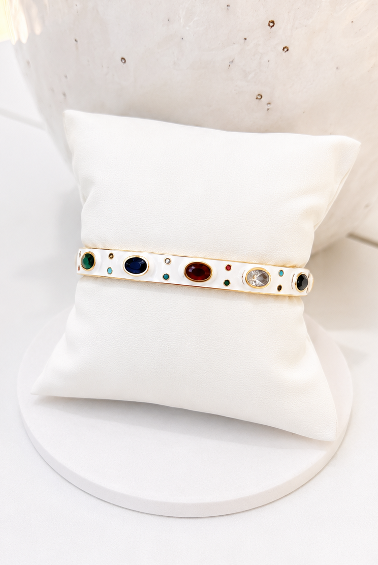 
                  
                    Close-up of the Fiorella White Enamel Multi-Crystal Gold Bangle
                  
                