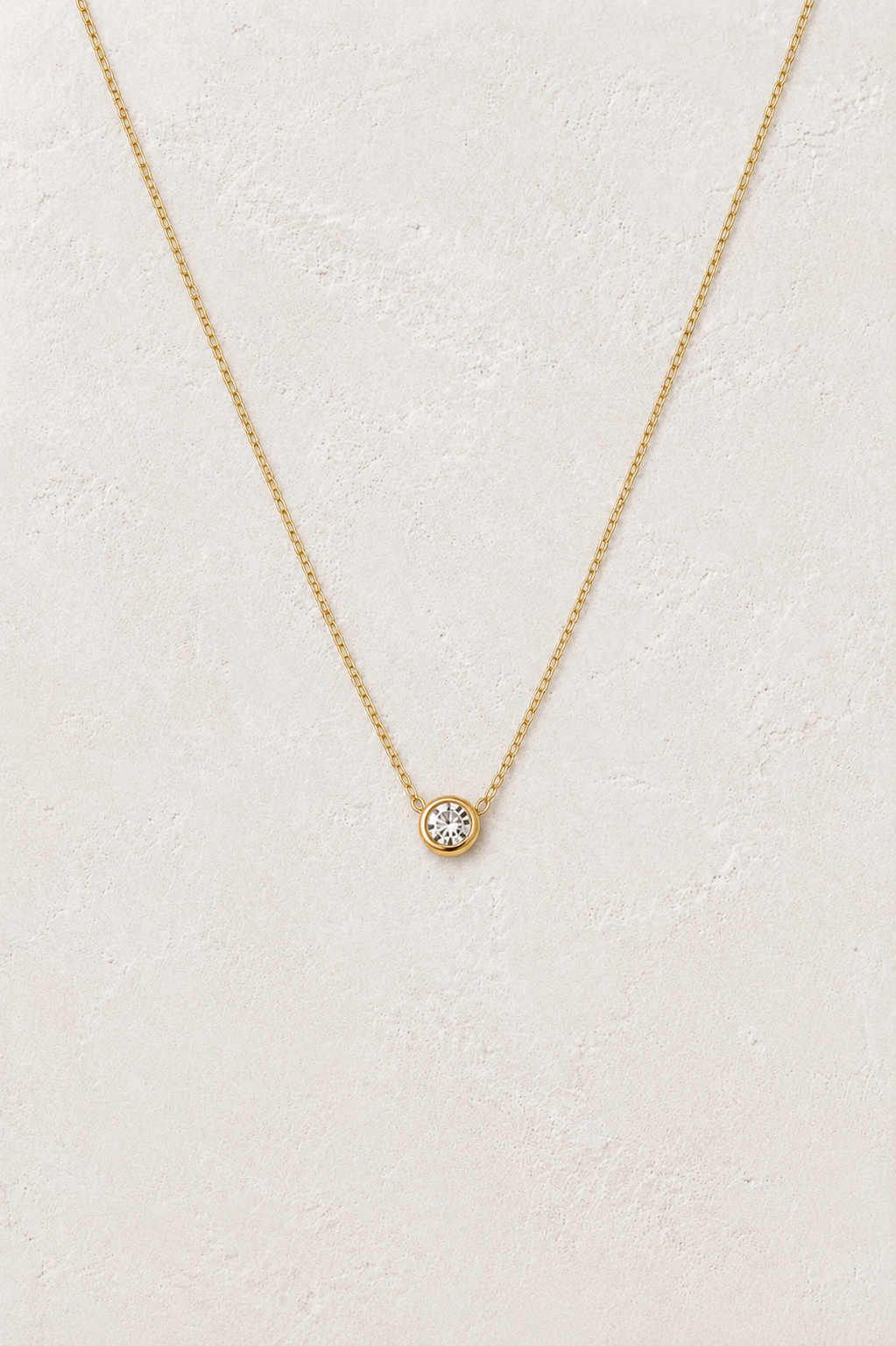 
                  
                    Celeste Cubic Zirconia Solitaire Necklace – Waterproof Gold Stainless Steel
                  
                