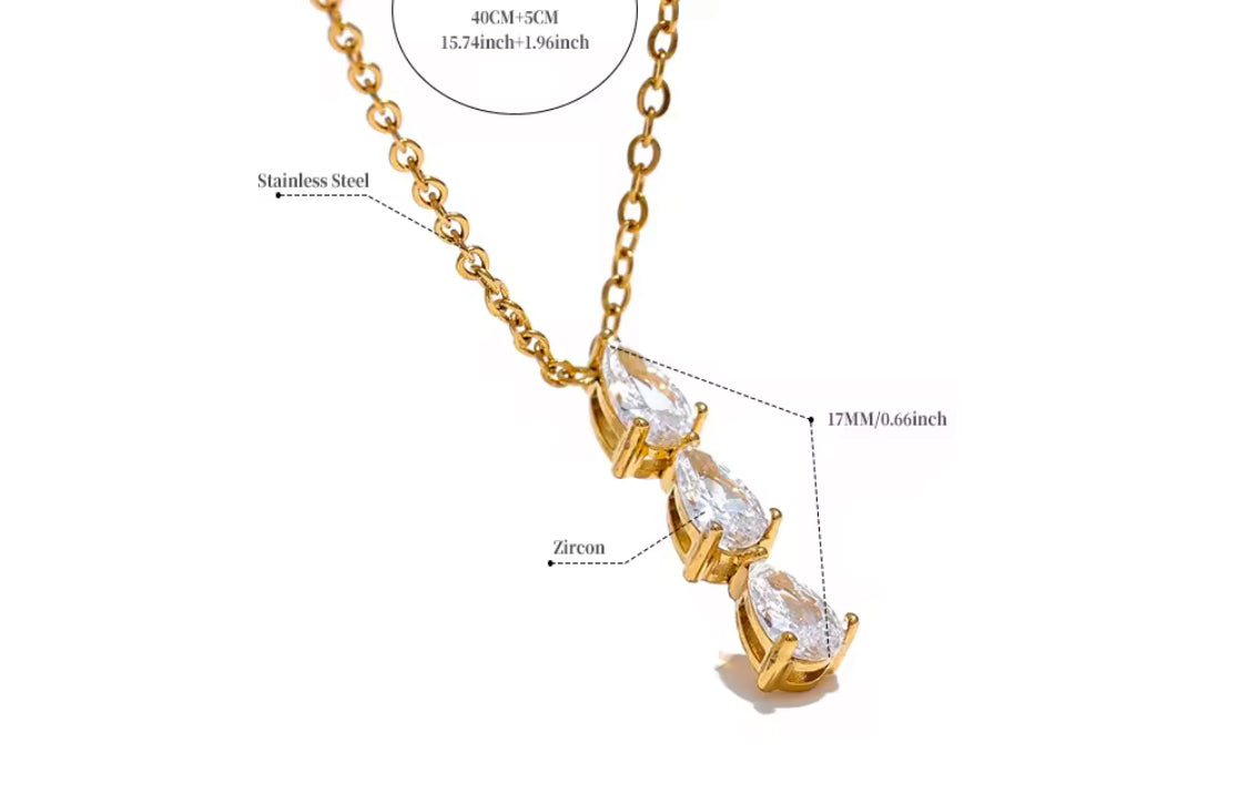 
                  
                    Amara Triple Zirconia Drop Necklace – Waterproof Gold-Plated Stainless Steel
                  
                