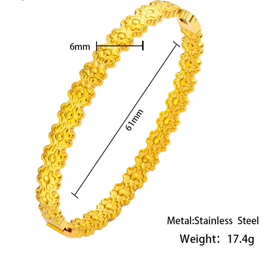 
                  
                    Golden Blossom Floral Link Gold Bracelet displayed on a white stand
                  
                