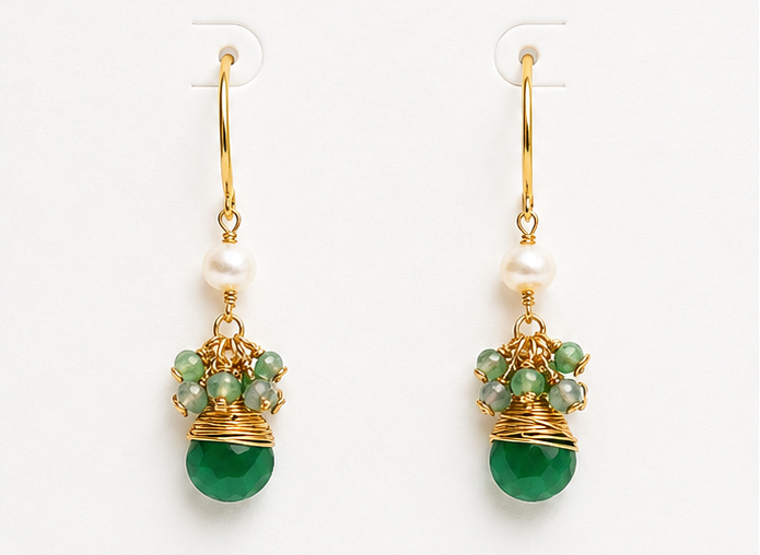 
                  
                    Green earrings on a BOHO & MALA branded card with 'Jewellery for the Soul' text.
                  
                