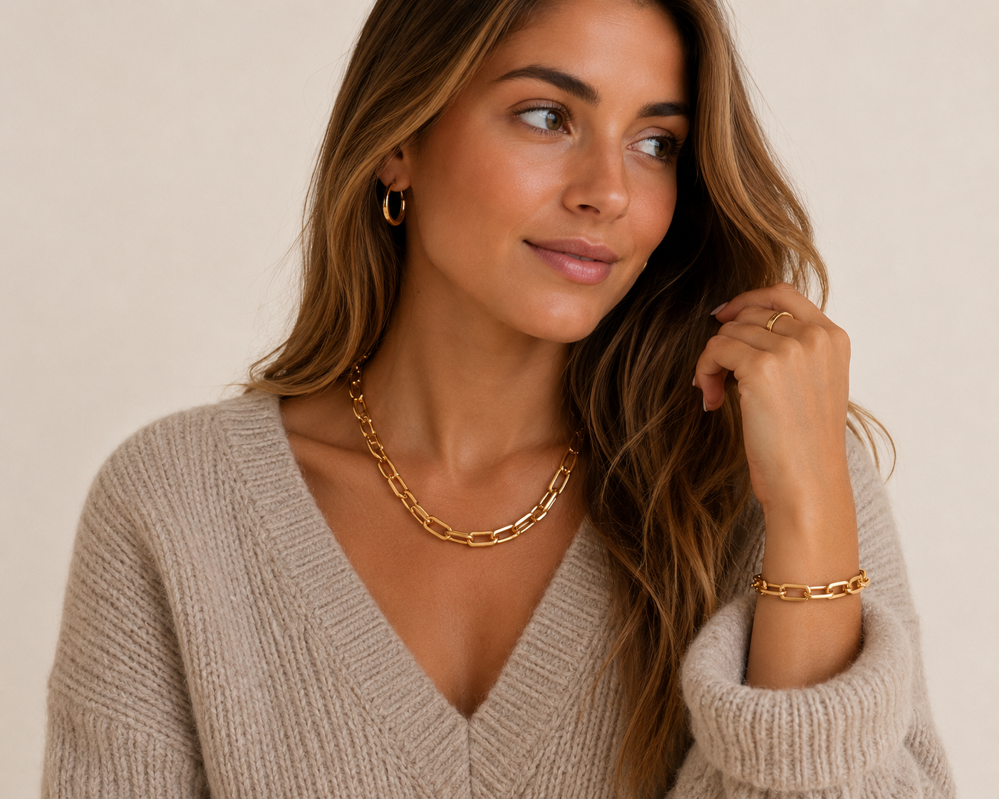 
                  
                    Bold Link Gold Toggle Bracelet displayed on a white stand
                  
                