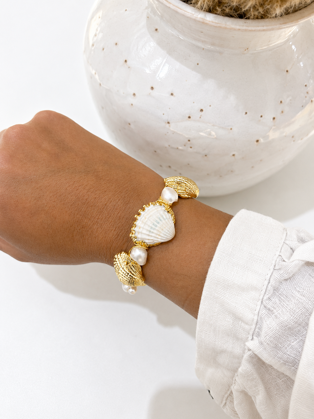 
                  
                    Coralia Shell & Freshwater Pearl Cuff
                  
                