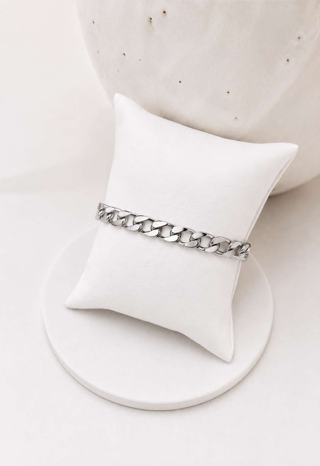 
                  
                    Harlow Silver Curb Link Bracelet displayed on a white stand
                  
                