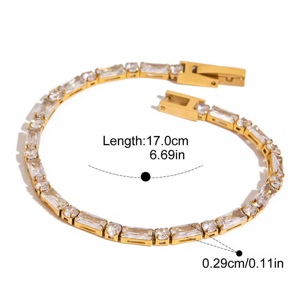 
                  
                    Avelisse Emerald & Round Crystal Gold Tennis Bracelet – alternate view
                  
                