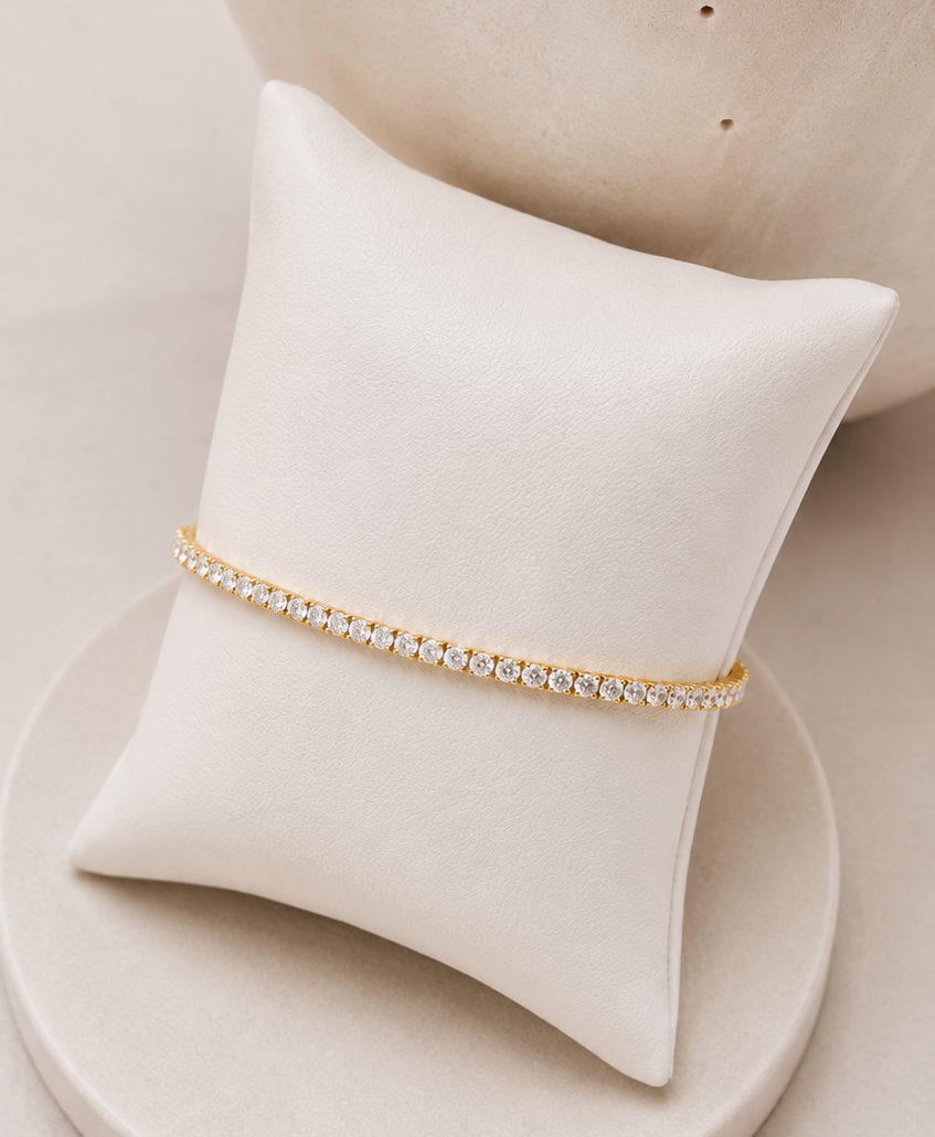 
                  
                    Close-up of the Aurelle Fine Gold Crystal Tennis Bracelet
                  
                