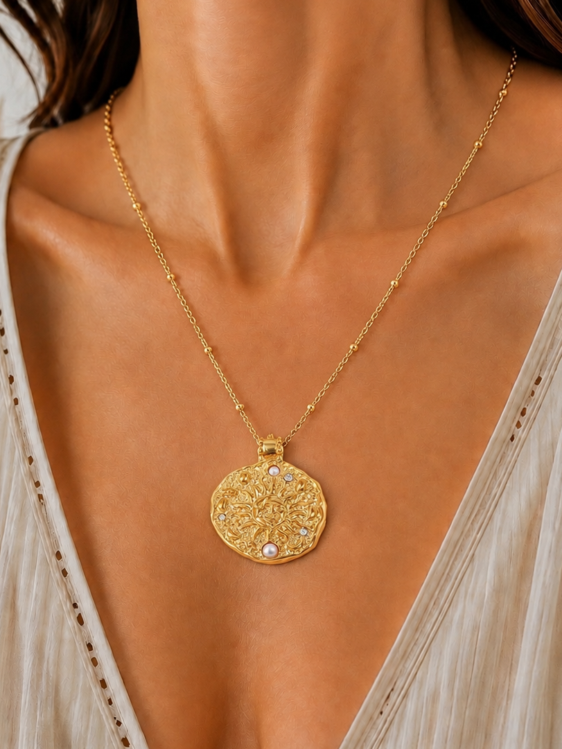 
                  
                    Soleil Pearl Sun Medallion Necklace – Waterproof & Tarnish-Free
                  
                