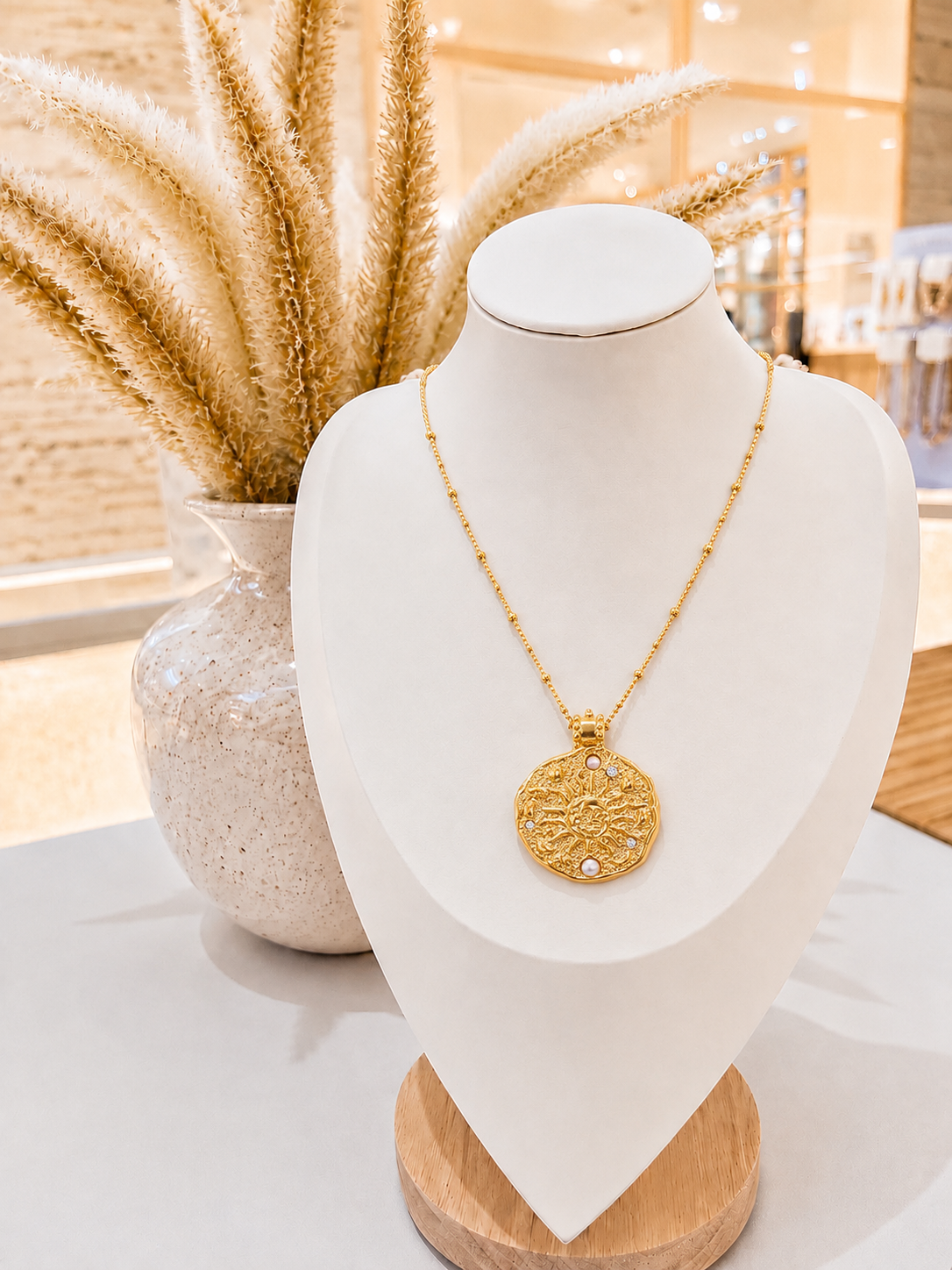 
                  
                    Soleil Pearl Sun Medallion Necklace – Waterproof & Tarnish-Free
                  
                