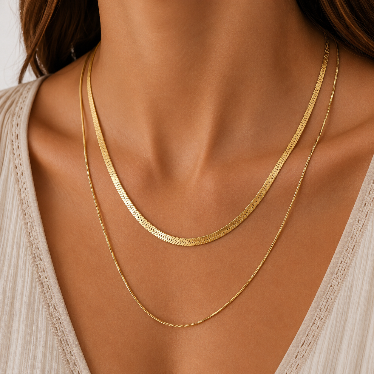 
                  
                    Mila Double Layer Herringbone Necklace – Waterproof Gold-Plated Stainless Steel
                  
                
