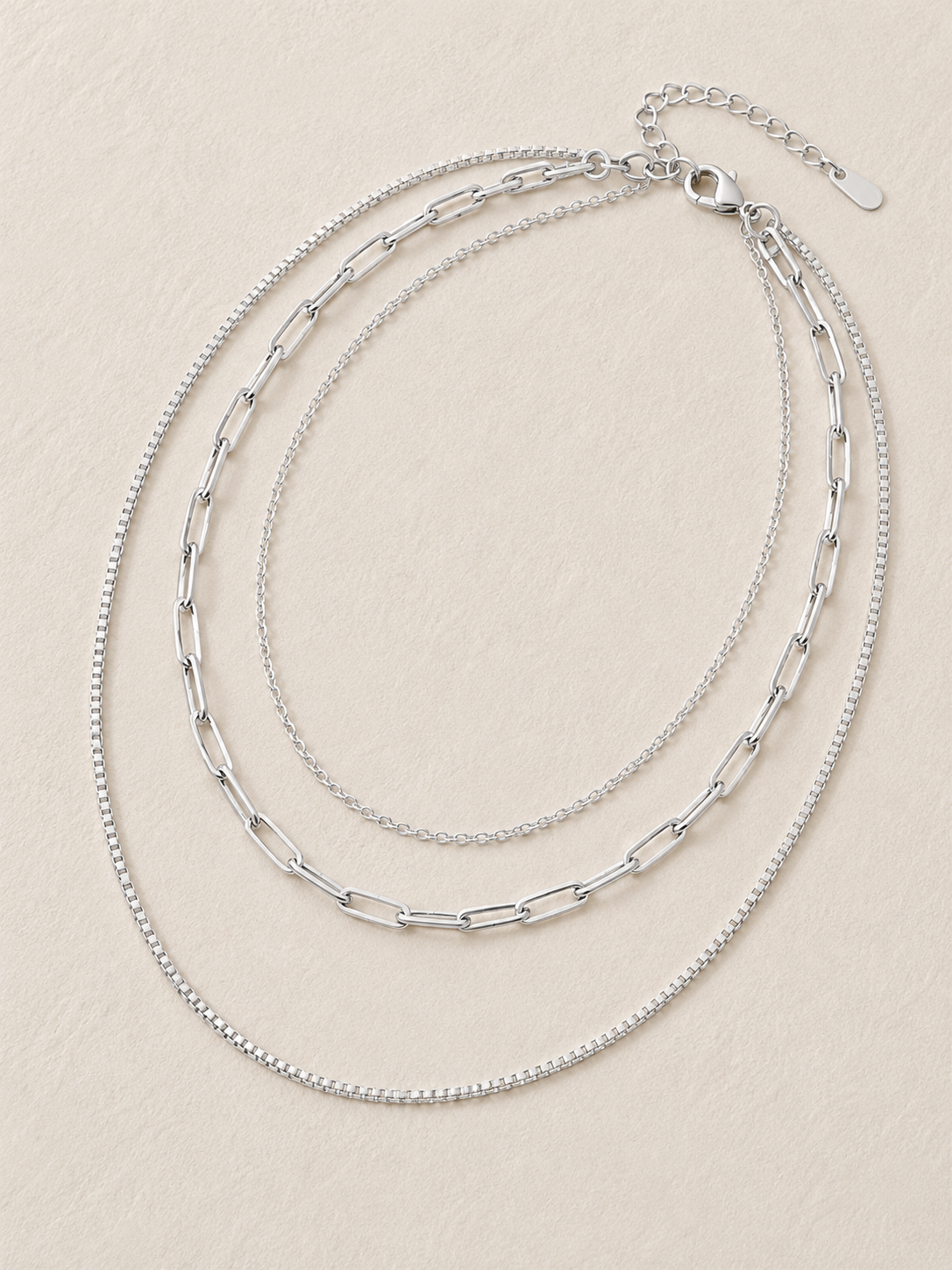 
                  
                    Capri Silver Triple Layer Chain Necklace – Waterproof Stainless Steel
                  
                