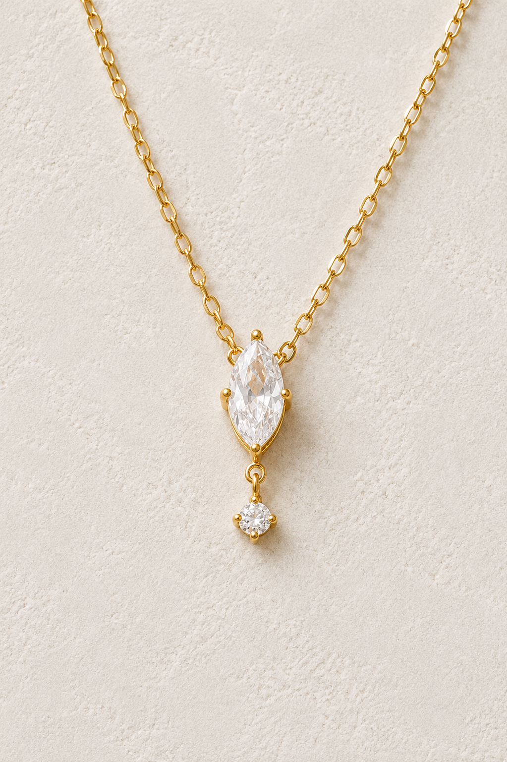 
                  
                    Elara Marquise Cubic Zirconia Necklace – Waterproof Gold-Plated Stainless Steel
                  
                