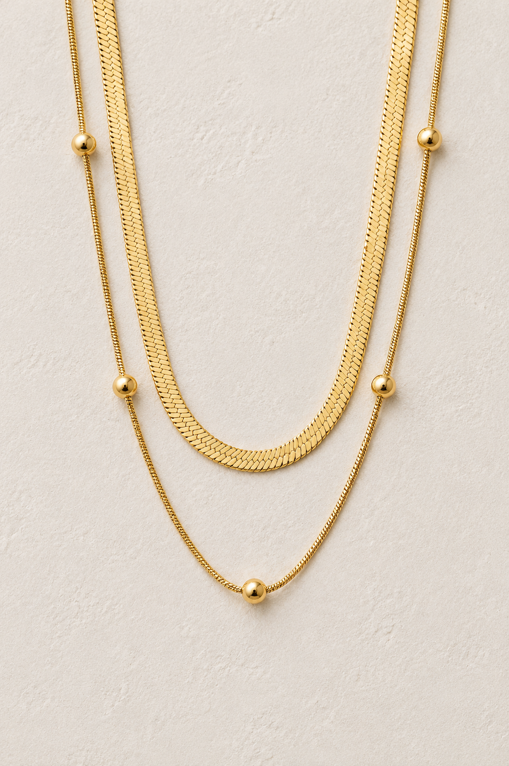 
                  
                    Elara Beaded Double Layer Necklace – Waterproof Gold-Plated Stainless Steel
                  
                