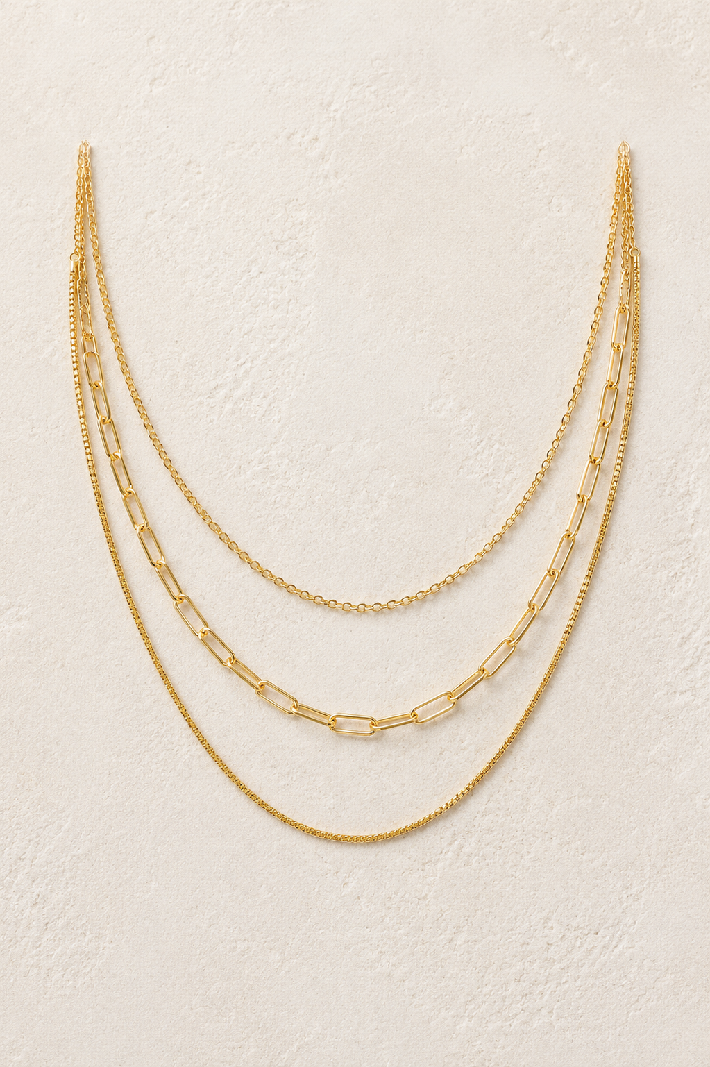 
                  
                    Amara Triple Layer Chain Necklace – Waterproof Gold-Plated Stainless Steel
                  
                