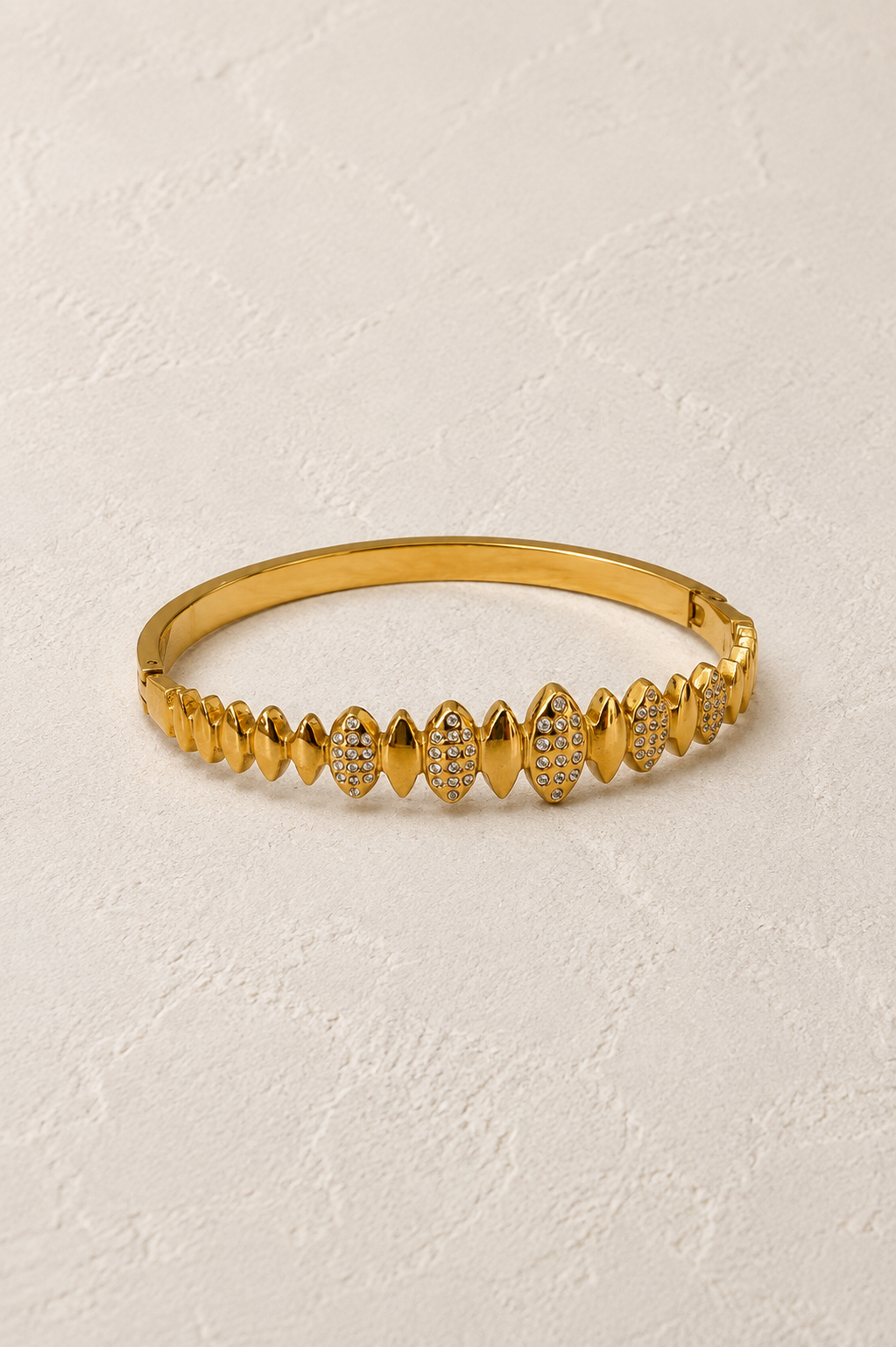 
                  
                    Solvaya Sculpted Gold Crystal Bangle – waterproof gold bangle by Boho & Mala
                  
                