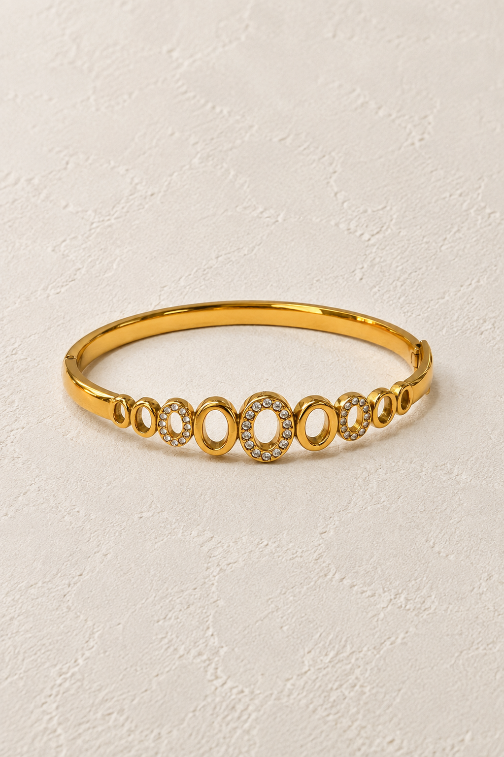 
                  
                    Amoura Open Oval Gold Crystal Bangle – waterproof gold bangle by Boho & Mala
                  
                