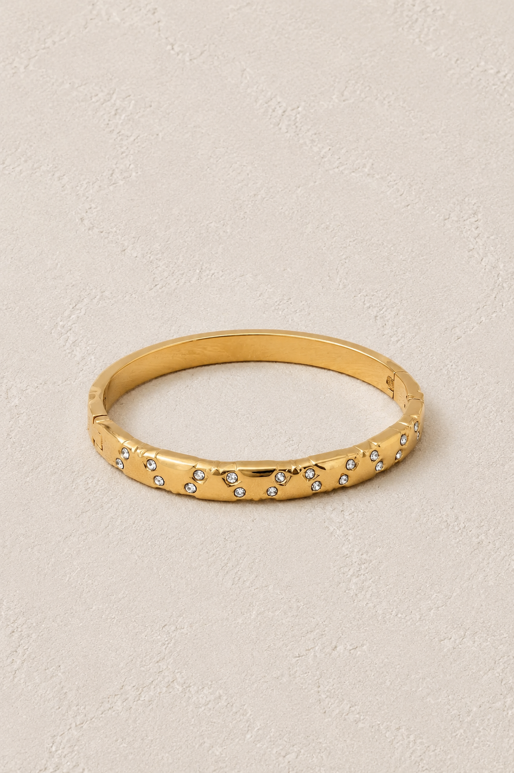 
                  
                    Stellara Textured Gold Scattered Crystal Bangle – waterproof gold bangle by Boho & Mala
                  
                