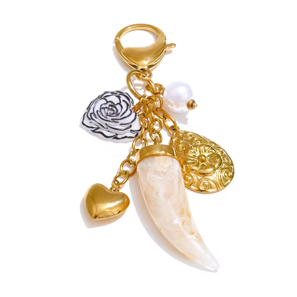 
                  
                    Lucky Tooth Charm Key Ring
                  
                