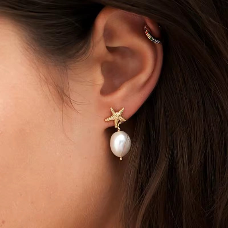 
                  
                    Pearl Estelle Earrings – Genuine Freshwater Pearl Starfish Drop Earrings
                  
                