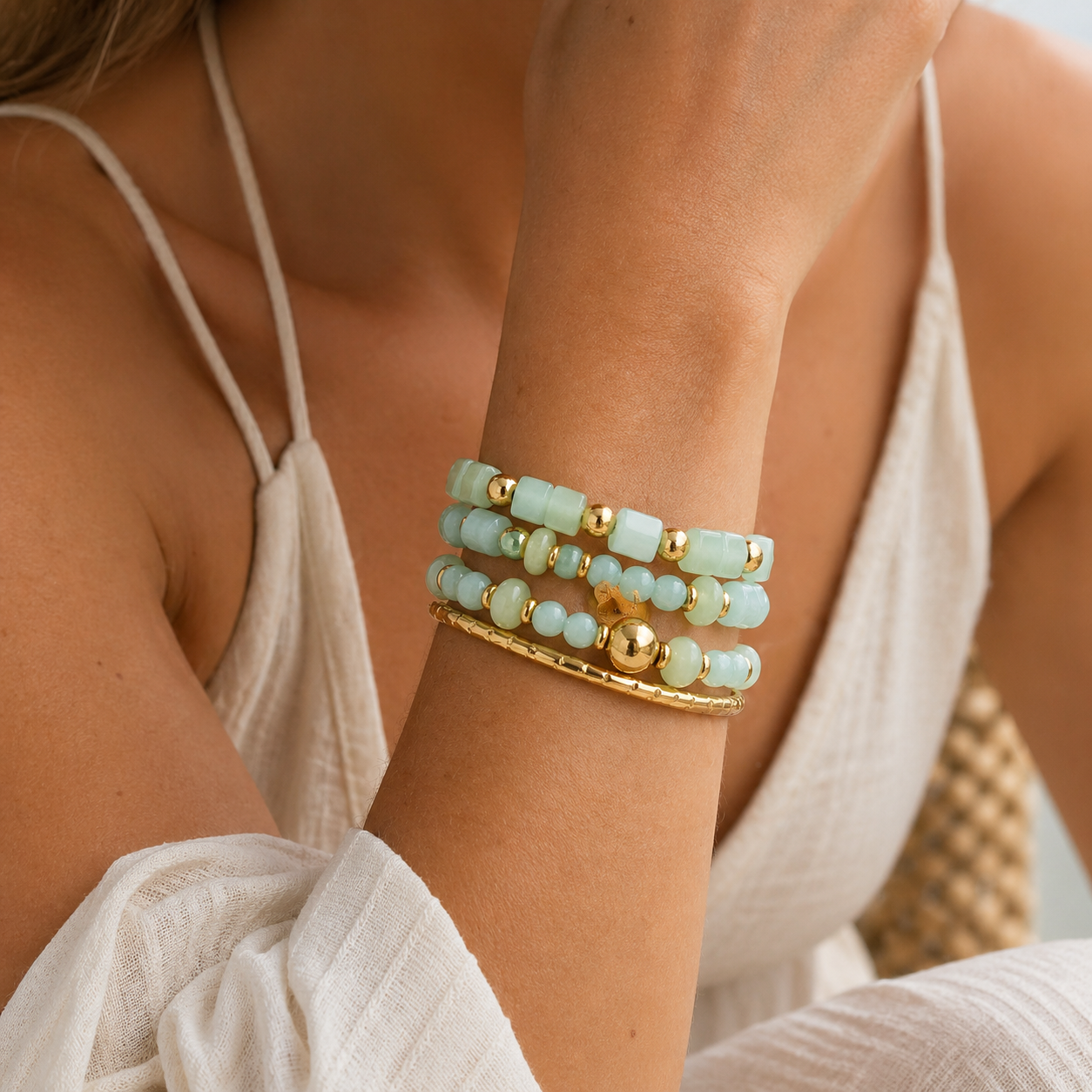 
                  
                    Aqua Serenity Beaded Bracelet Stack worn on a model's wrist
                  
                