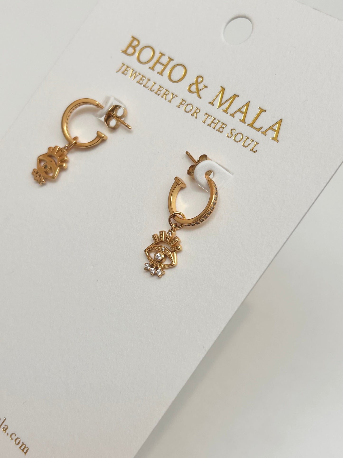 
                  
                    Savia Evil Eye Charm Hoops original product photo
                  
                