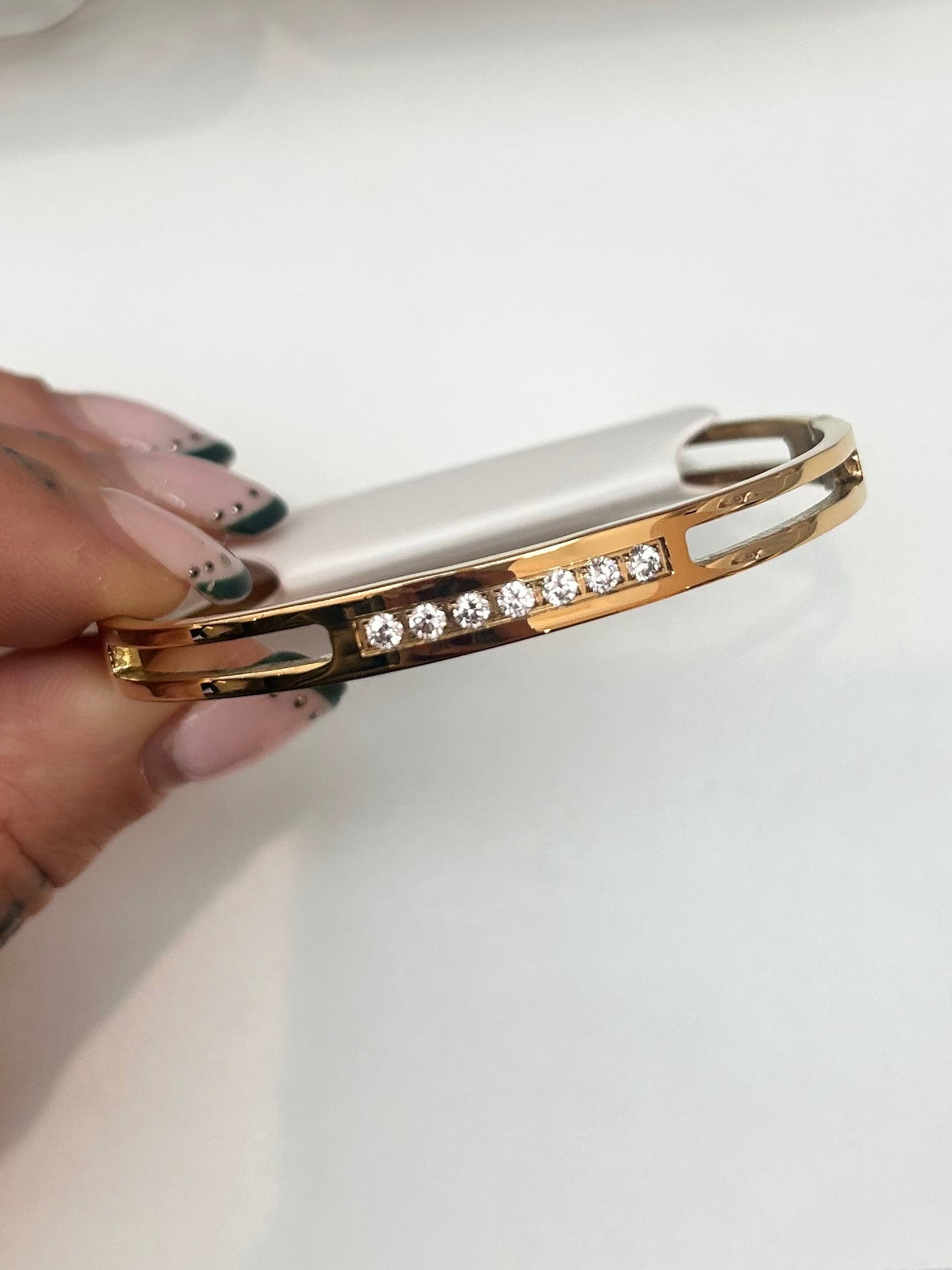 
                  
                    Elira Gold Double Row Crystal Bangle — original display photo
                  
                