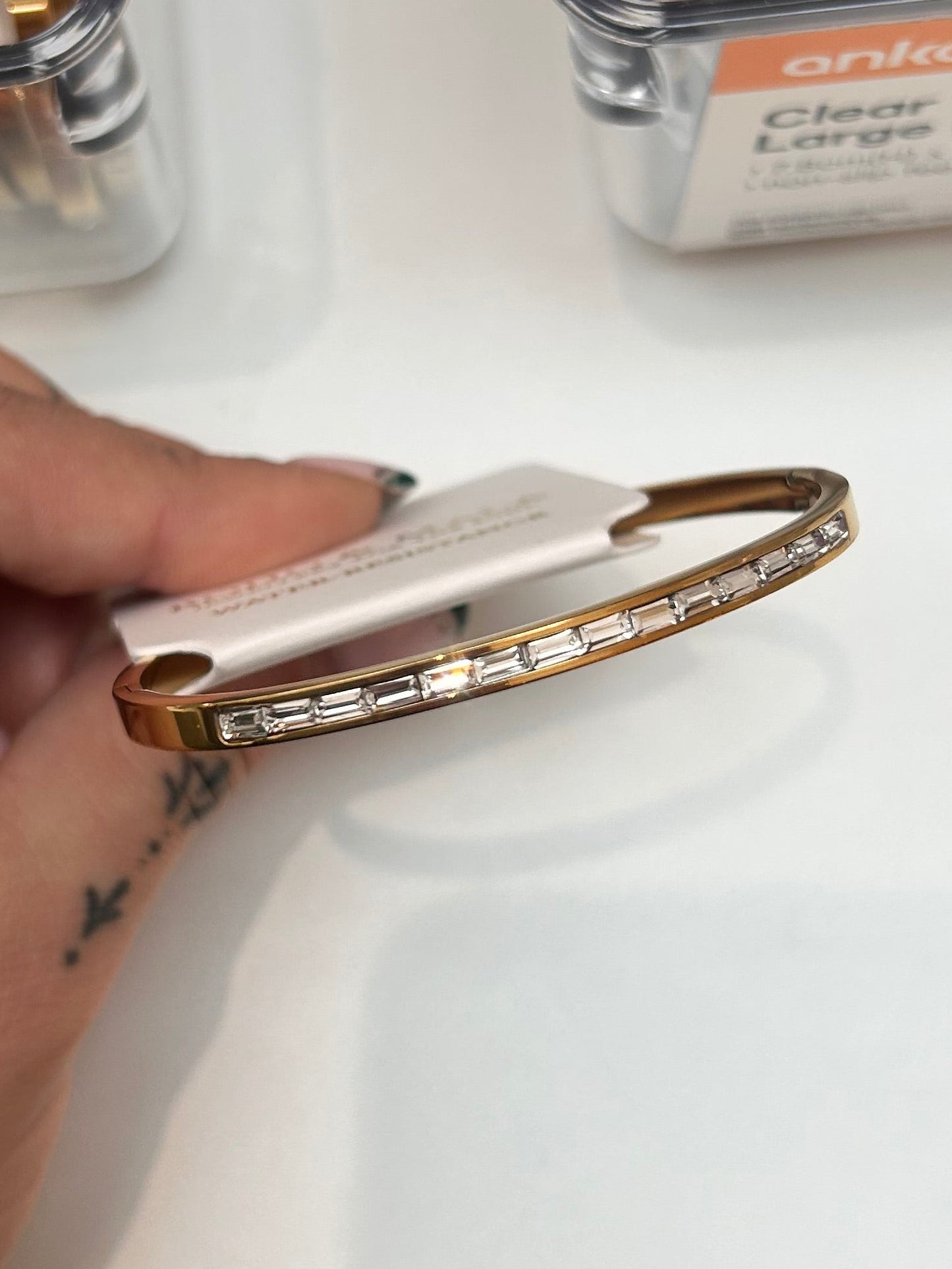 
                  
                    Vela Gold Baguette Crystal Bangle — original display photo
                  
                