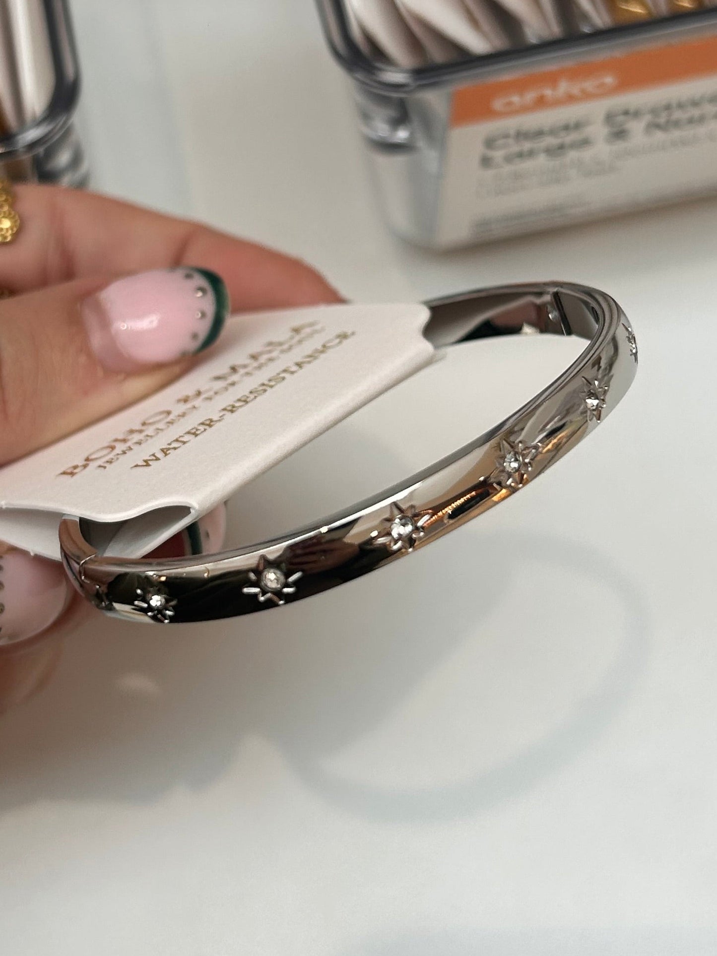 
                  
                    Celestia Silver Starburst Bangle — original display photo
                  
                