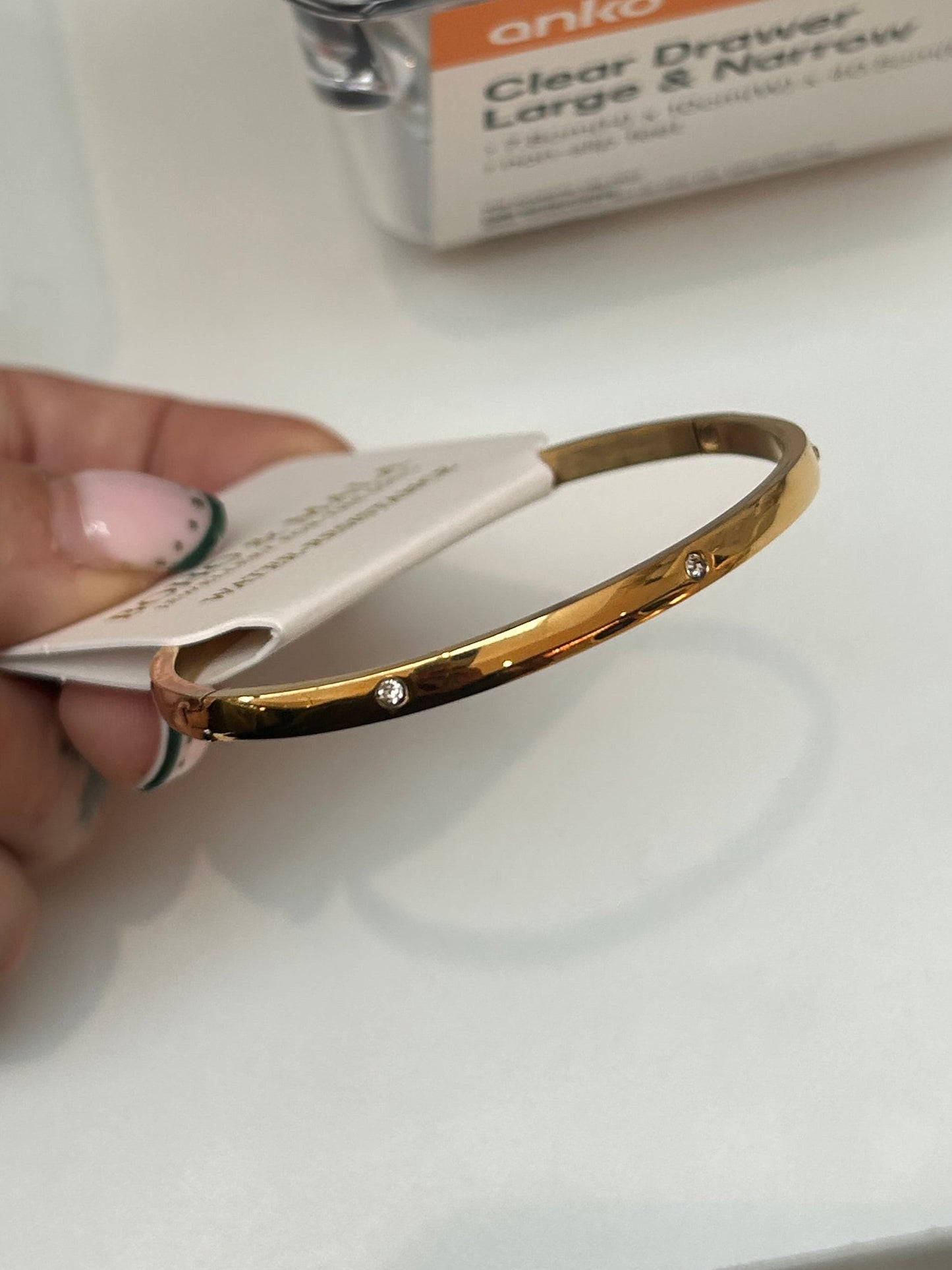 
                  
                    Amelie Gold Crystal Station Bangle — original display photo
                  
                