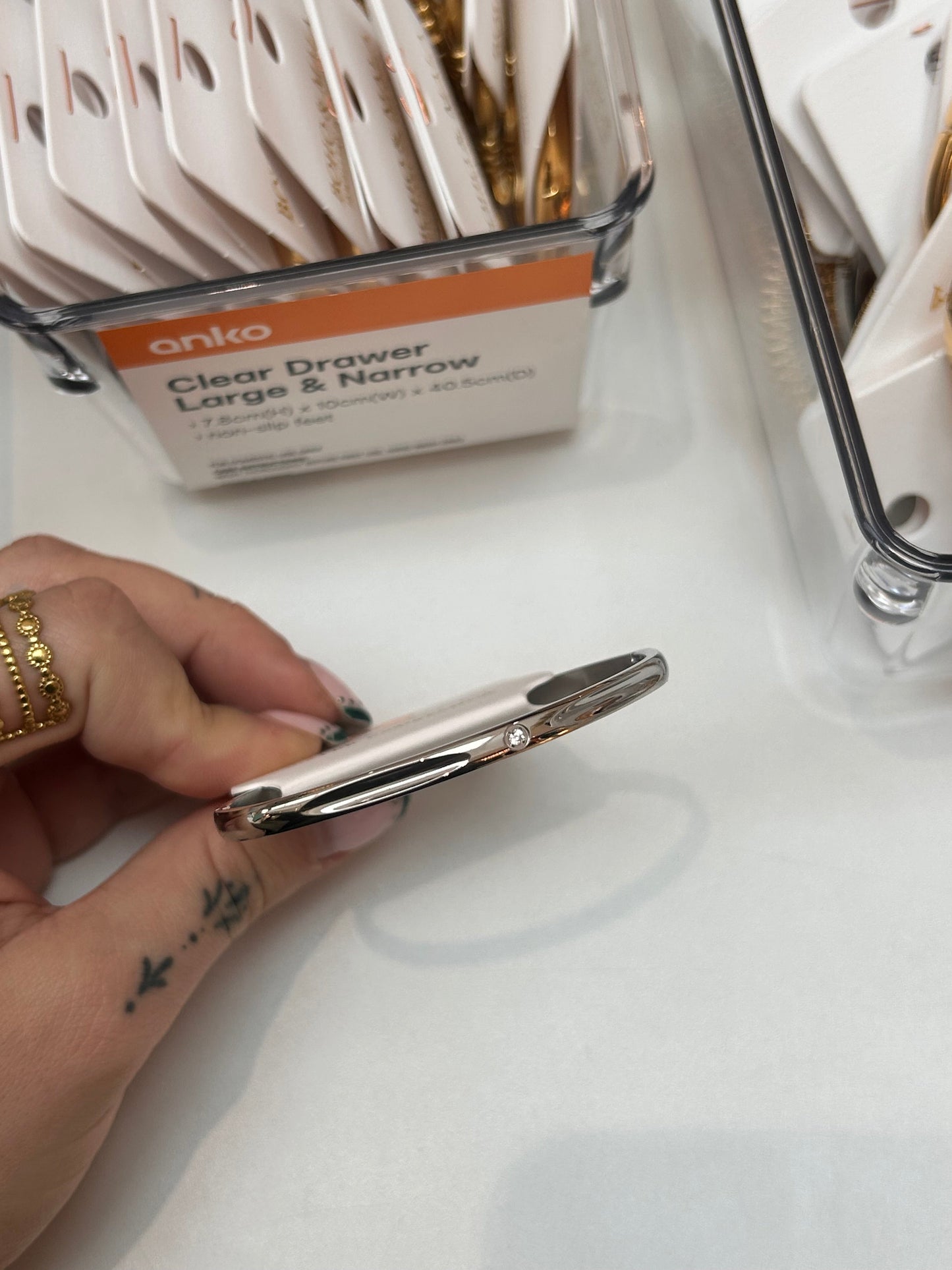 
                  
                    Sola Silver Solitaire Bangle — original display photo
                  
                