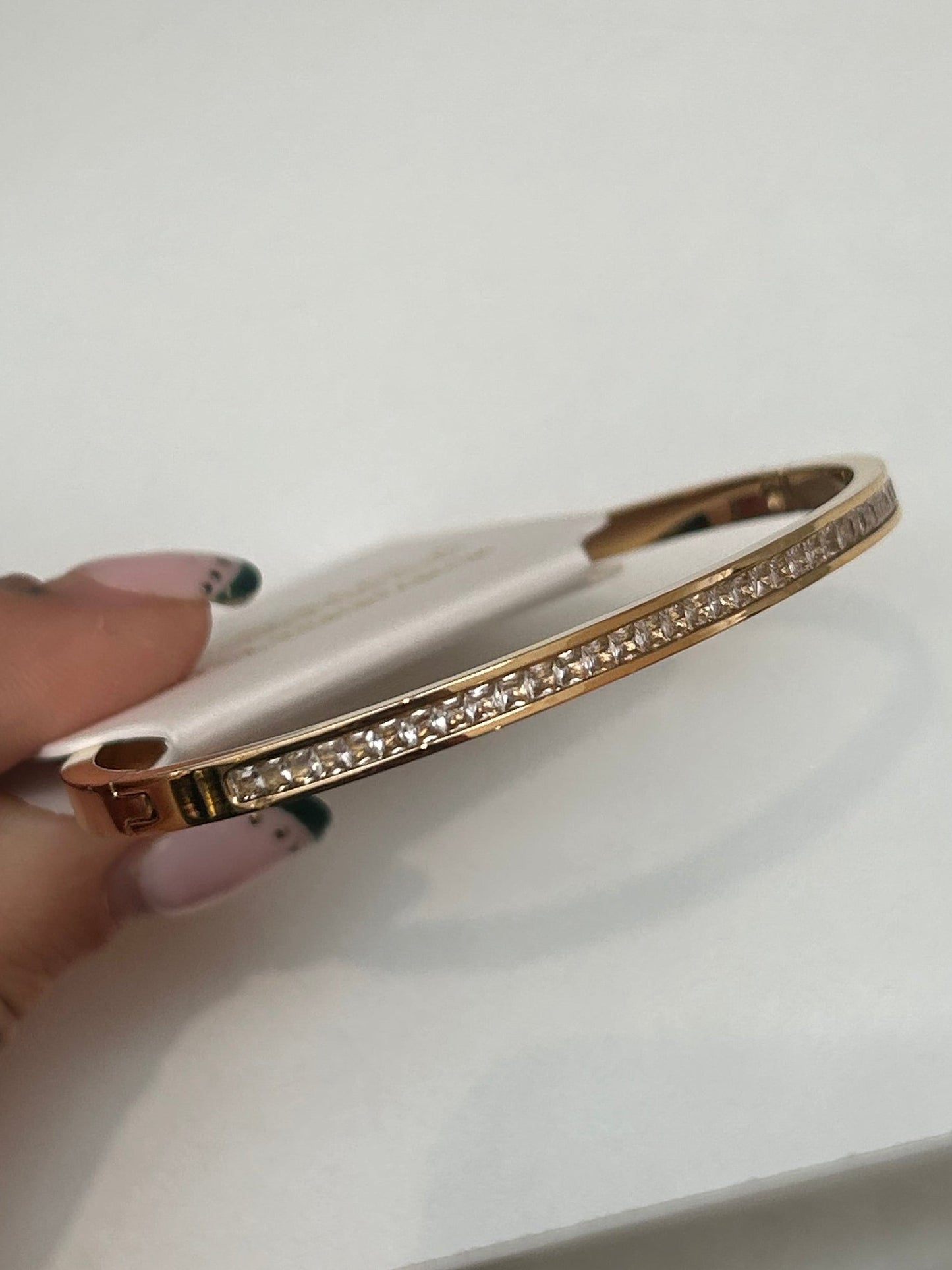 
                  
                    Lumi Gold Pavé Bangle — original display photo
                  
                